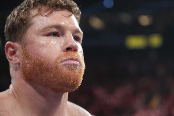 Canelo Alvarez (red trunks) and Gennadiy Golovkin (white trunks) box during a super middleweight championship bout at T-Mobile Arena.